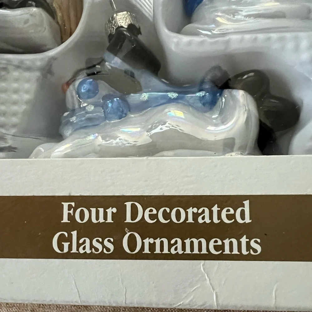 Set of (4) 2001 Target decorated iridescent glass snowman ornaments
